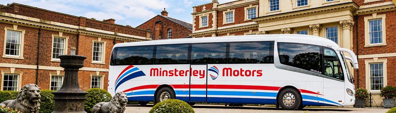 A Minsterley Motors coach parked outside a country house